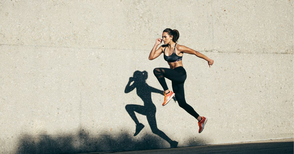 Woman performing moderate intensity aerobic exercise to lose weight