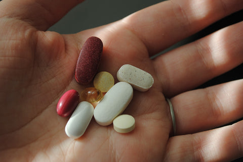 supplements in female hand