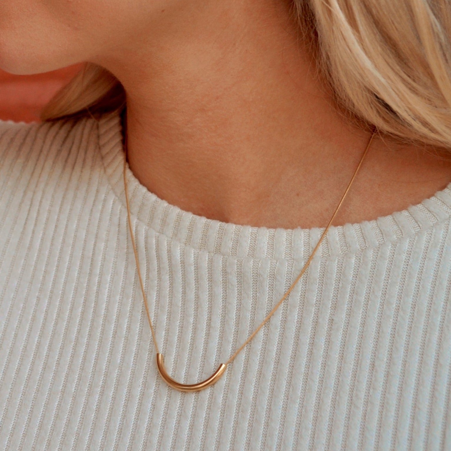 minimalist gold pendant