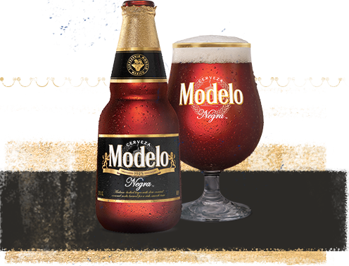 Modelo Negra being poured out of a beer can