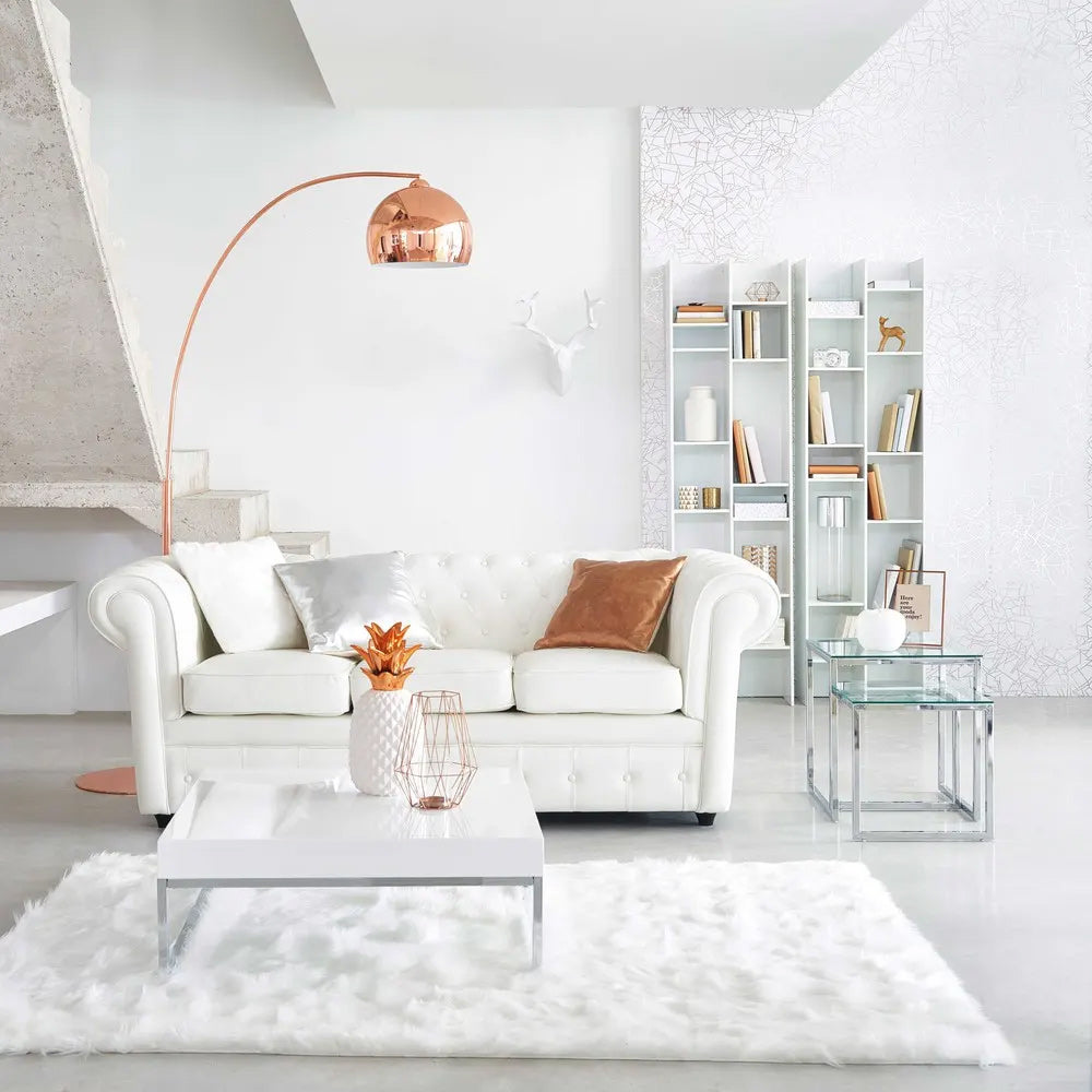 White room with faux sheepskin