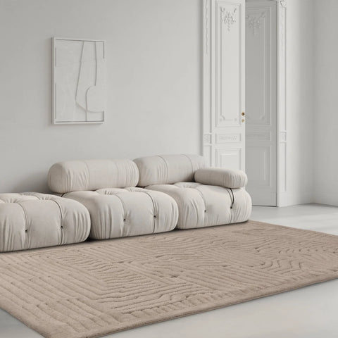 A Minimaluxe room with elements of luxury and minimalism. The Valley Natural rug pulls this room together