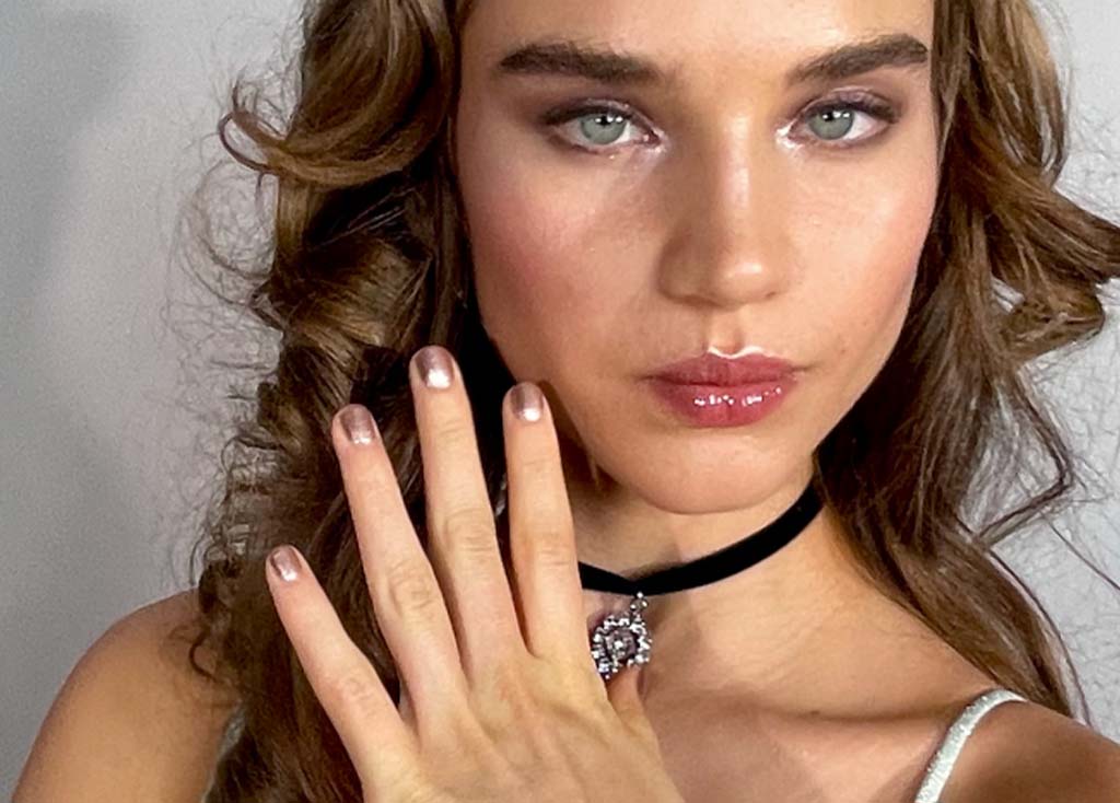 Model showing rose gold Nails