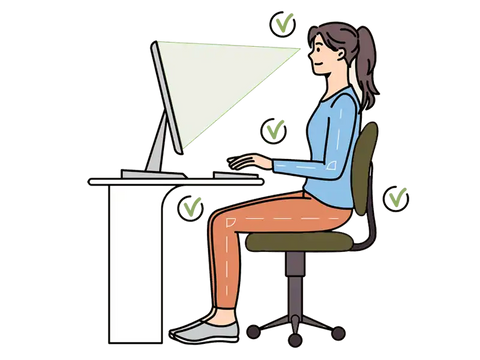 Productive woman using ergonomic chair and workstation setup.