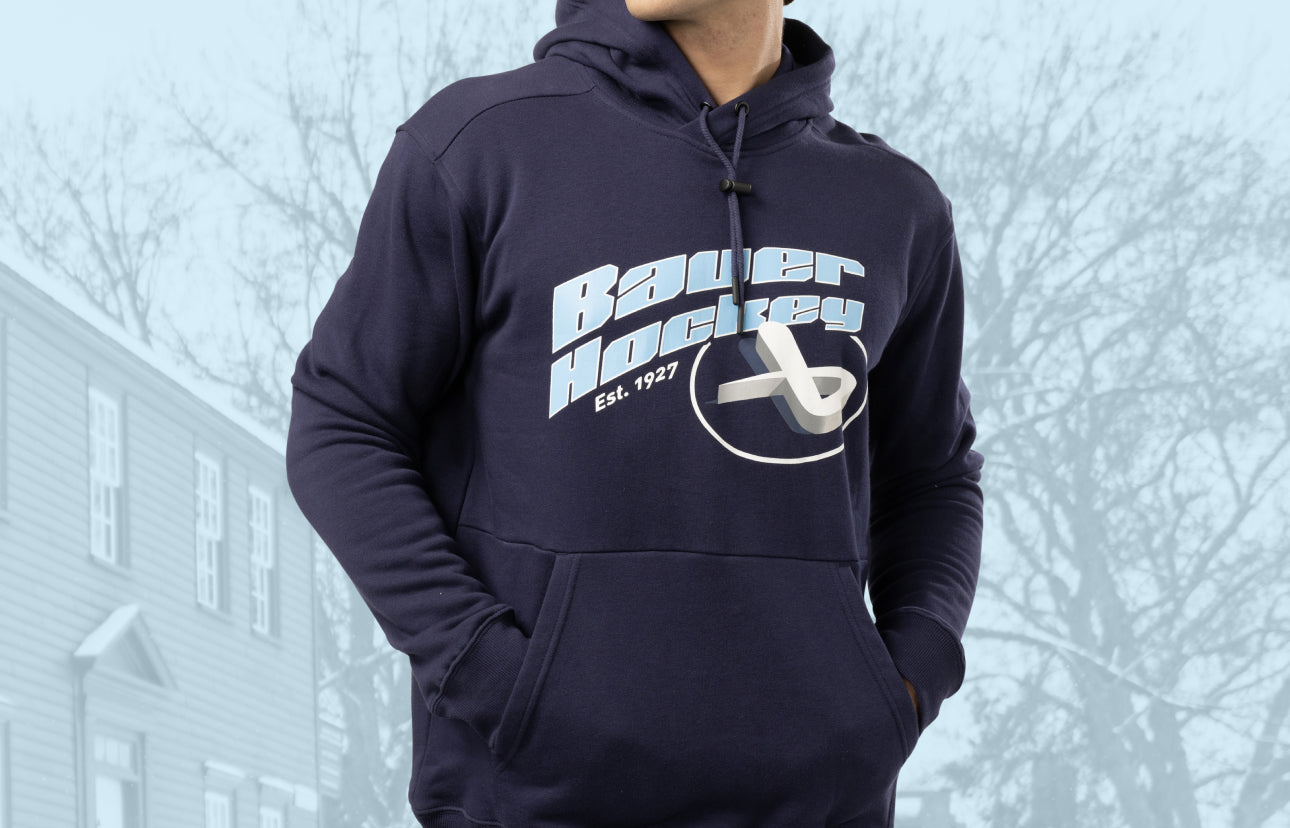 catalog image of a man in a blue hoodie with a light blue background