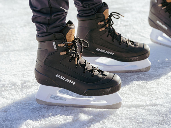 close up of colorado lifestyle skates on frozen pond