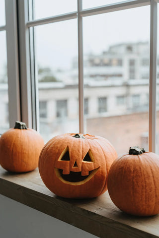 jack o' lanterns by the window