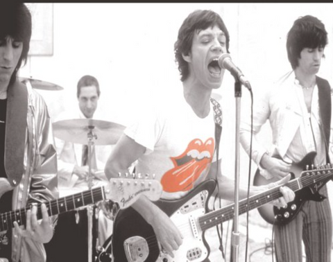 black and white photo with red tongue on mick jagger's shirt