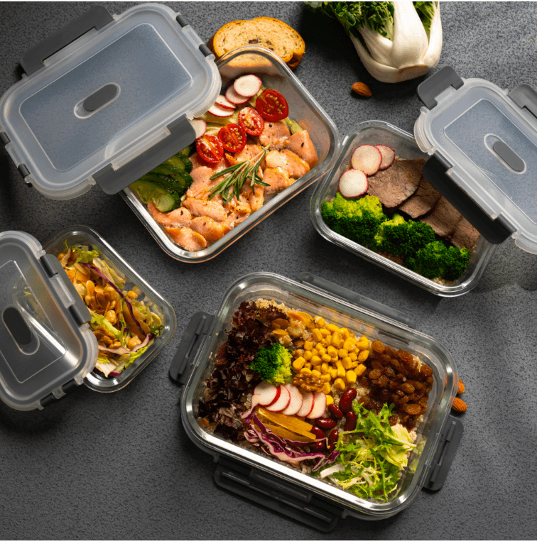 This image shows our Genicook glass bento boxes layed open with food inside the containers.