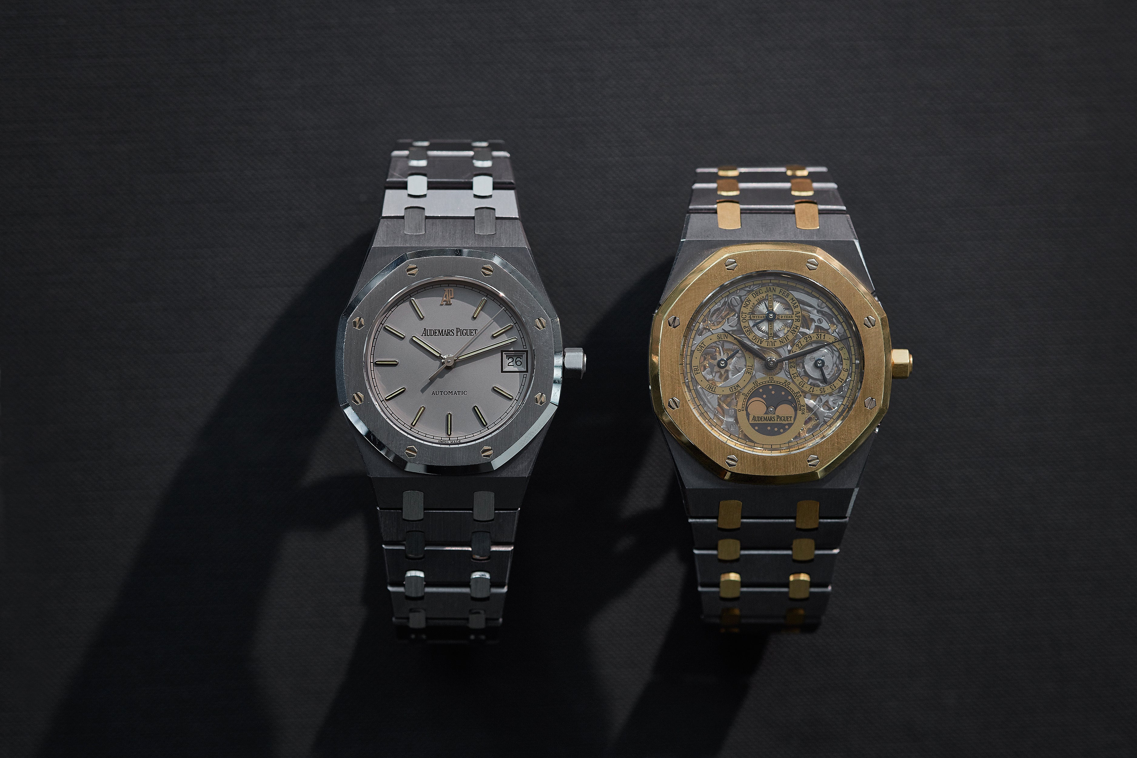 Audemars Piguet Royal Oak 14790 in Tantalum and steel next to a Royal Oak QP in Tantalum and rose gold for A Collected Man Lonodn