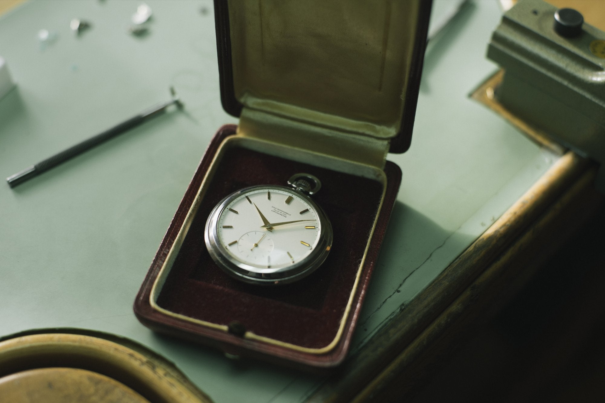 Philippe Dufour's school pocket watch in its case at his atilier in the Vallee de Joux from A Collected Man London