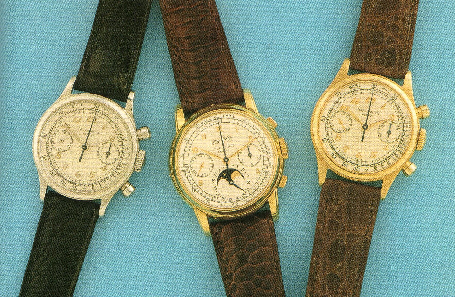 Three Patek Philippe chronographs on a blue background in The Early Days of Vintage Wristwatch Collecting for A Collected Man London