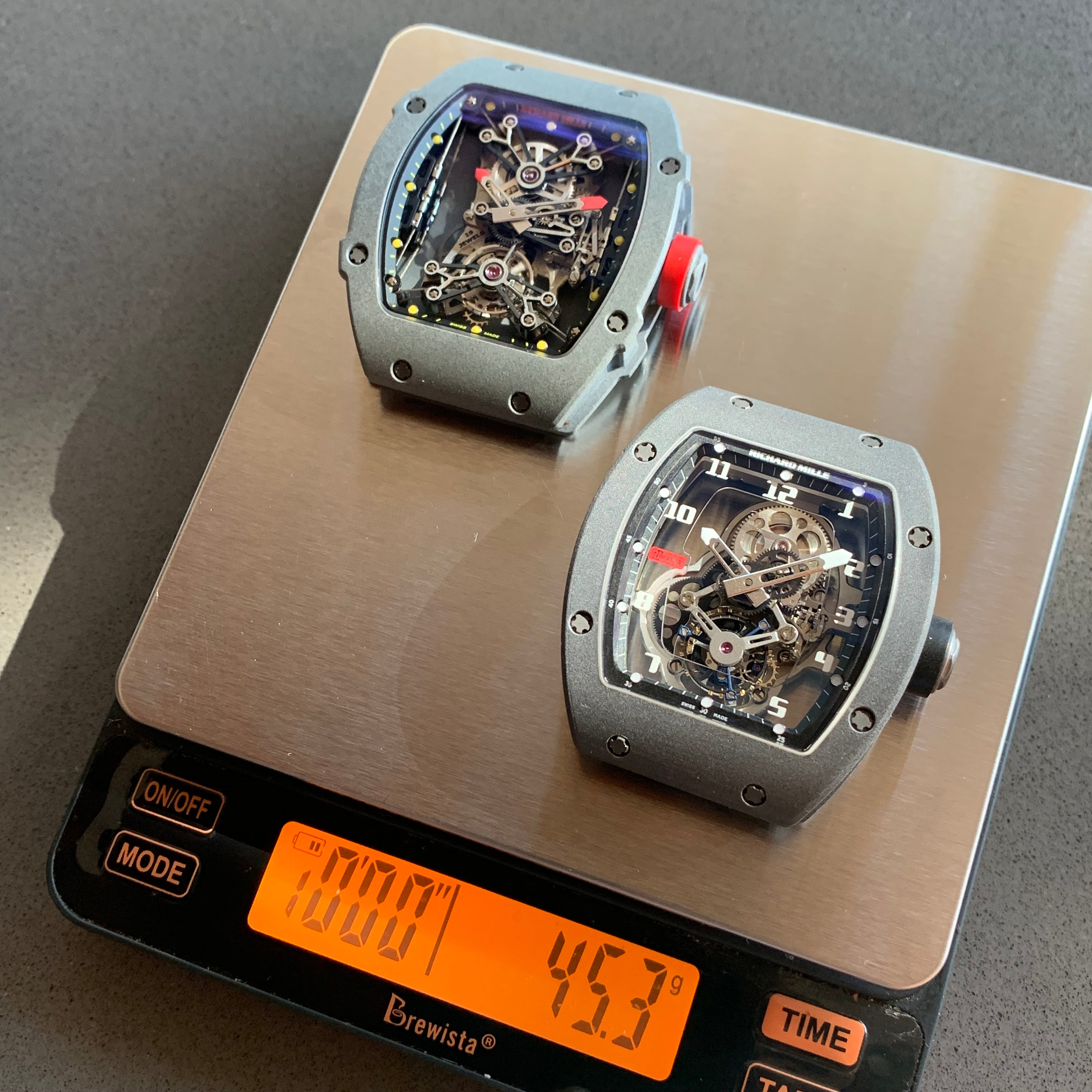 Eric Ku Richard Mille RM009 and RM027-01 on a weighing scales for A Collected Man London