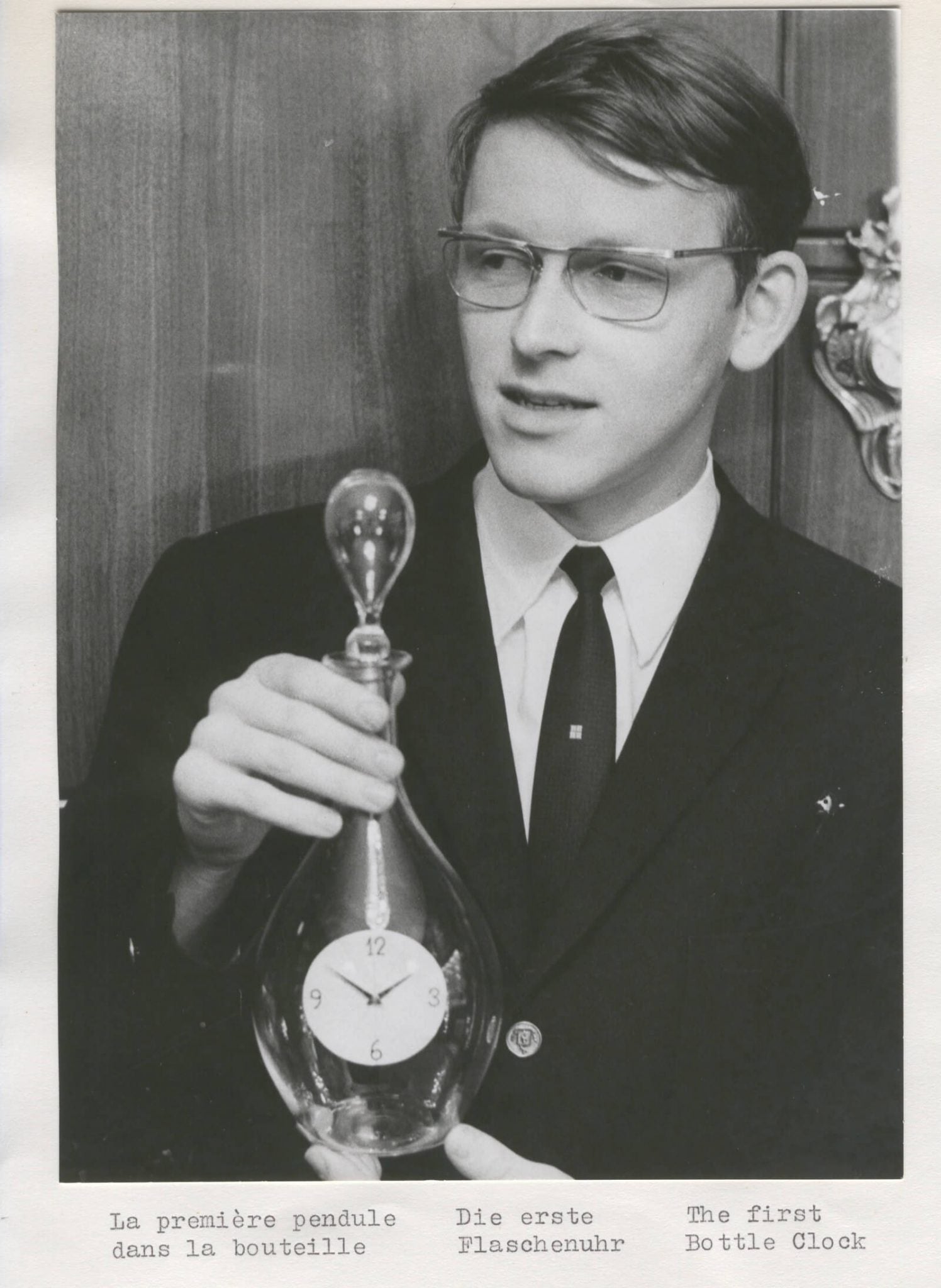Svend Andersen holding bottle clock In The Origins of the AHCI for A Collected Man London