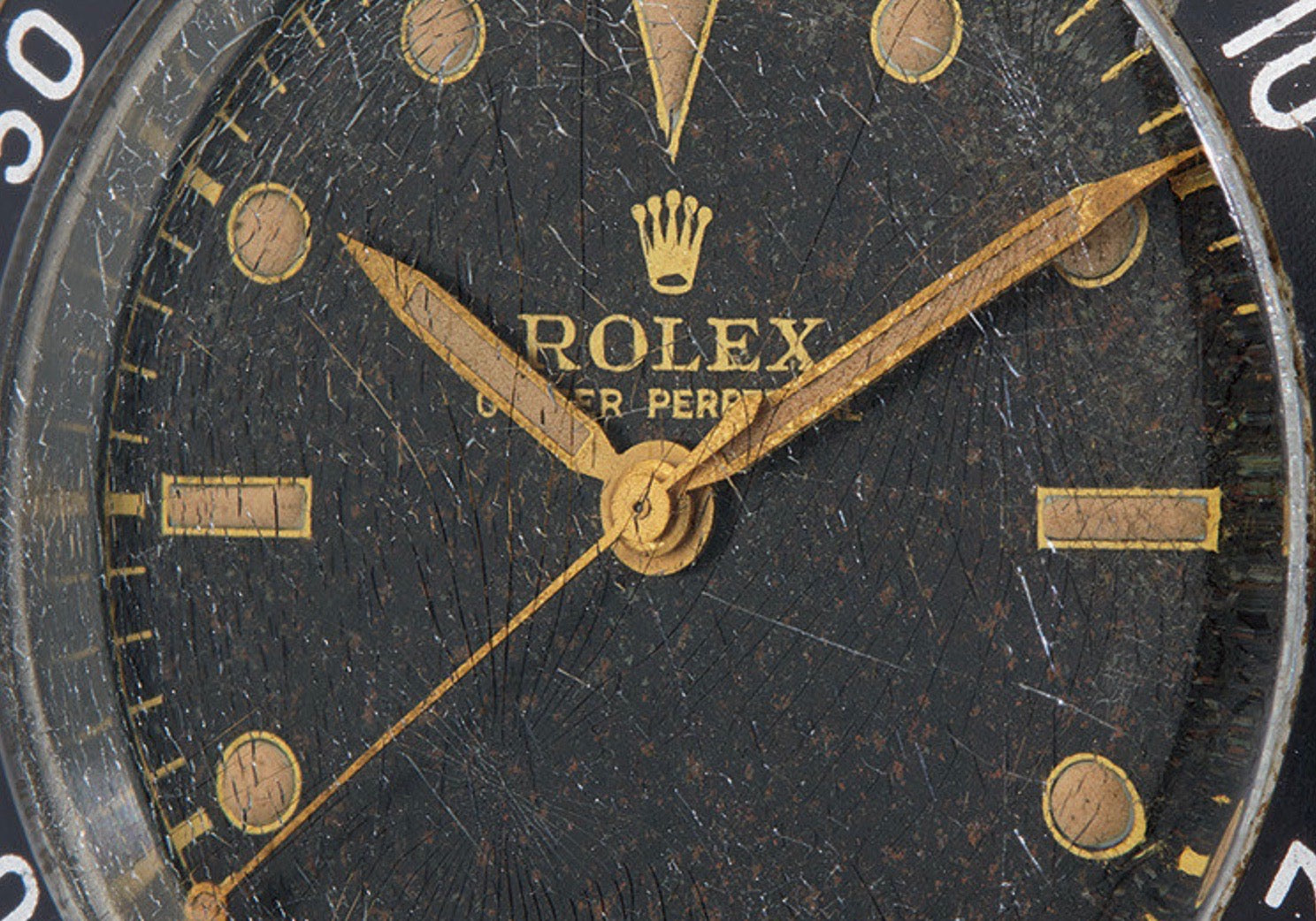 1954 Rolex Submariner with a cracked crystal and creamy lume plots sold at Phillips Game Changers auction