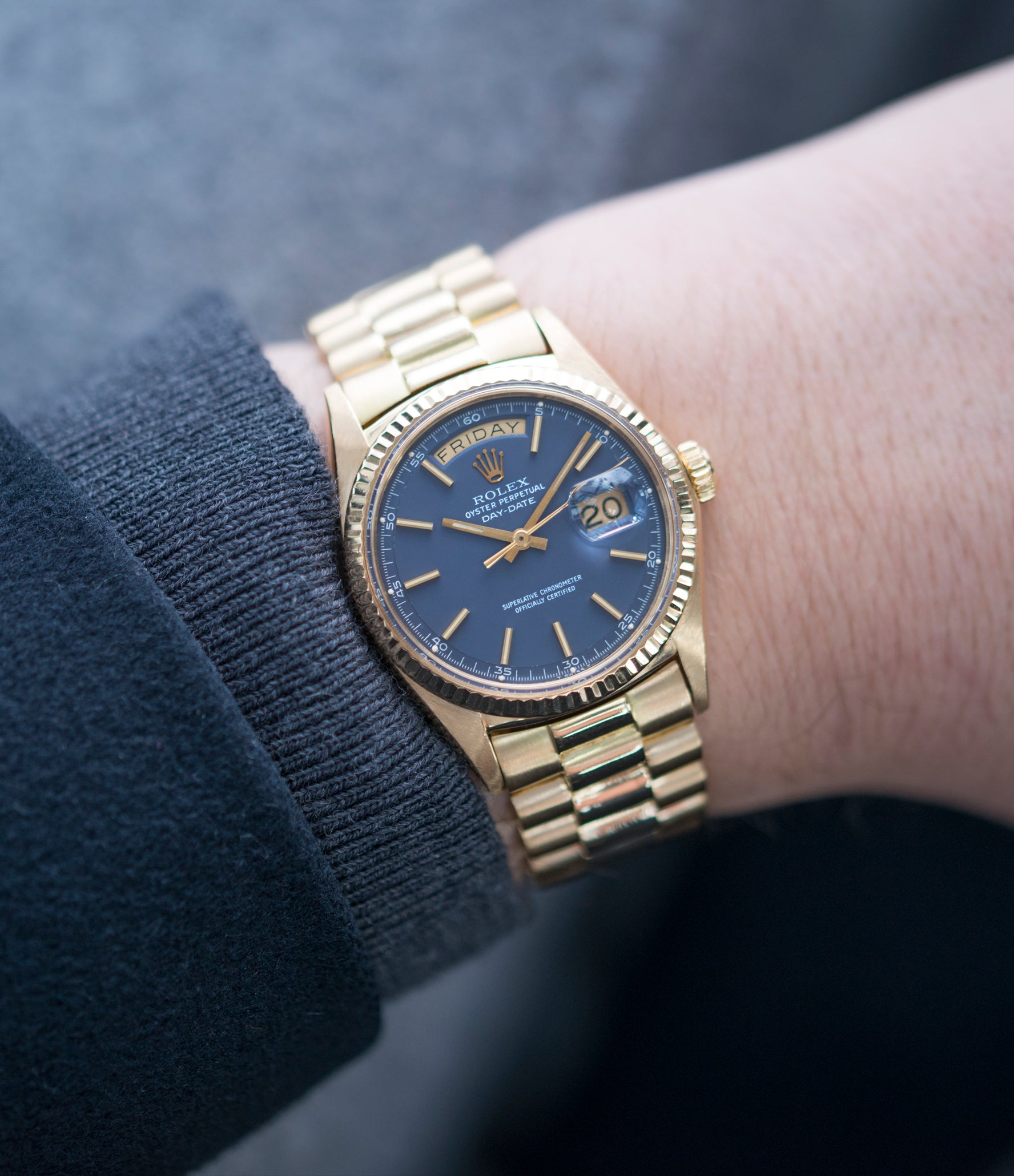 rolex day date gold on wrist