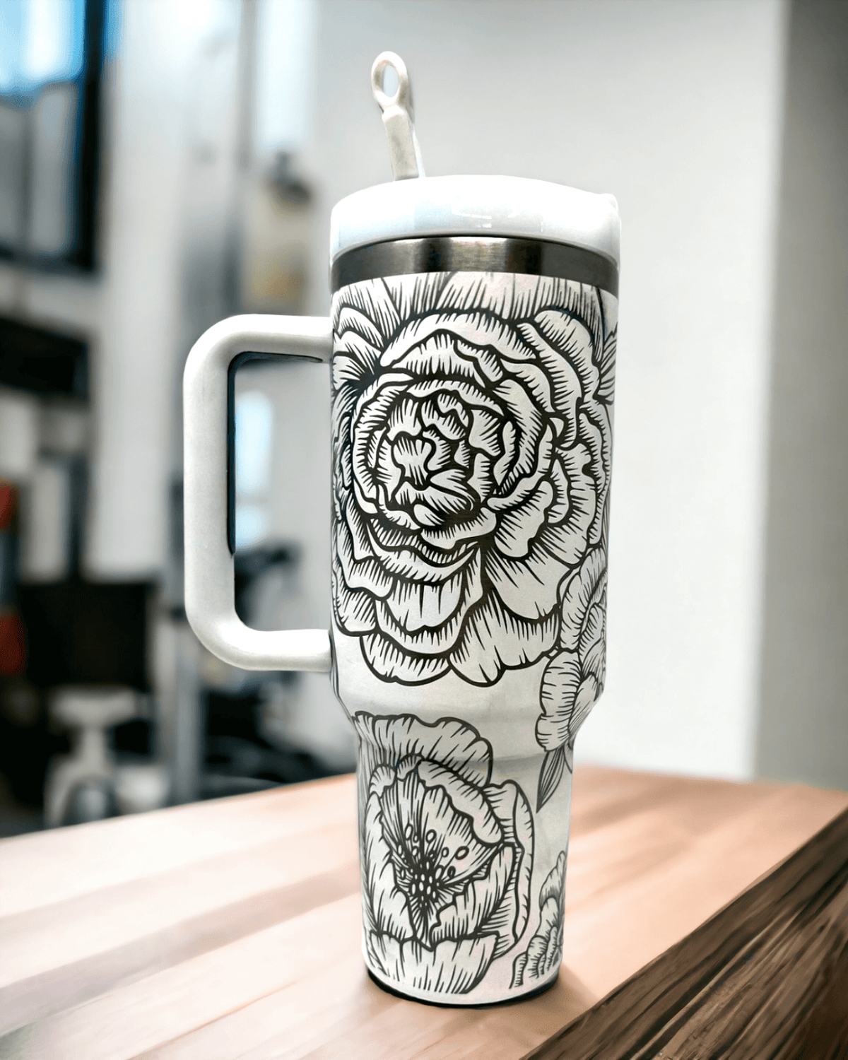 https://cdn.shopify.com/s/files/1/0606/5497/7184/files/wind-river-outpost-peony-40-oz-stanley-dupe_f1c9845a-d927-48e7-8dad-62e602690408_1200x.png?v=1690330116