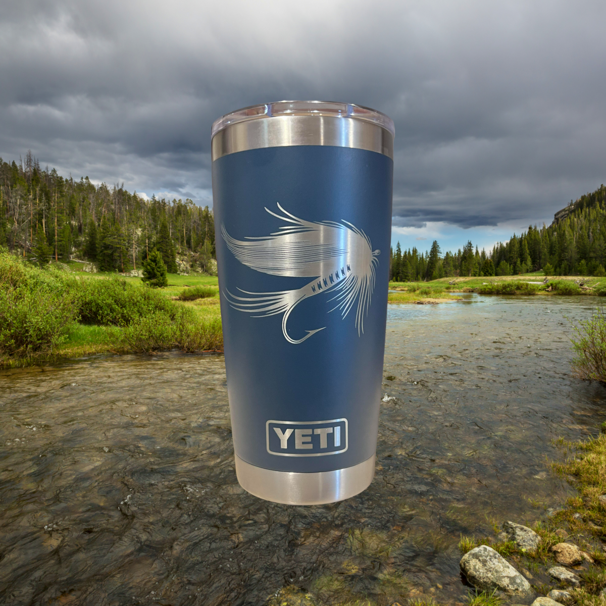 https://cdn.shopify.com/s/files/1/0606/5497/7184/files/wind_river_outpost_fly_fishing_yeti_navy_river_1200x.png?v=1690329006