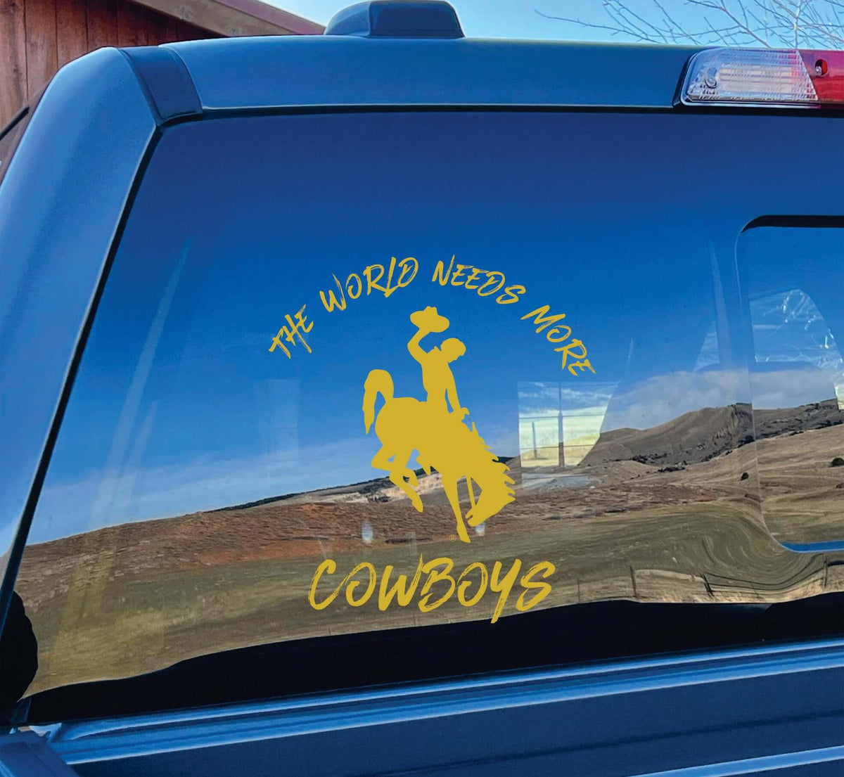 https://cdn.shopify.com/s/files/1/0606/5497/7184/products/world_needs_more_cowboys_vinyl_decal_gold_1200x.jpg?v=1690330988