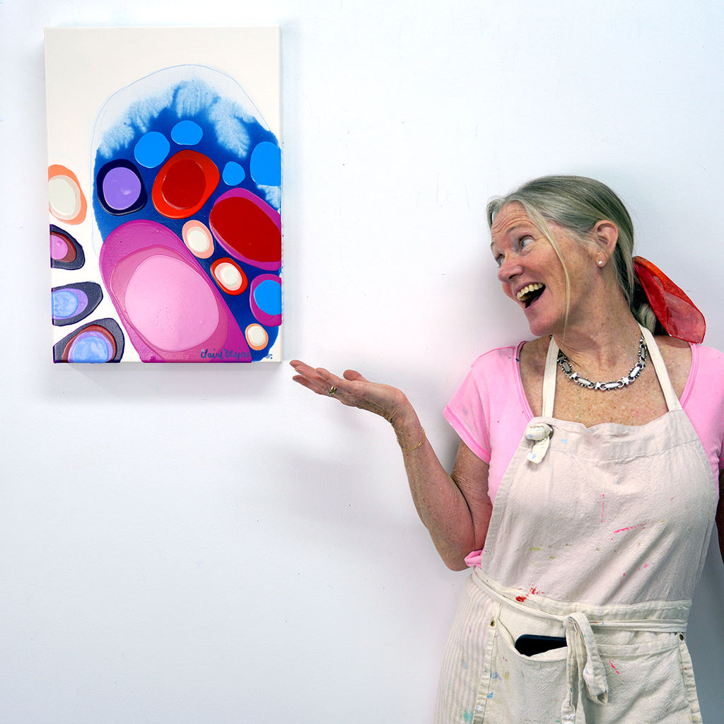 Abstract artist, Claire Desjardins, with her painting "Stop Time and Stay".