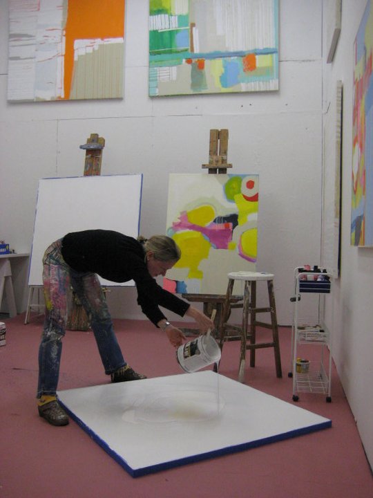 Abstract painter Claire Desjardins working in her studio at an artist residency.