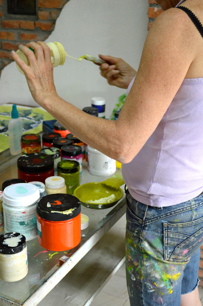 Artist Claire Desjardins, painting in her China artist residency studio