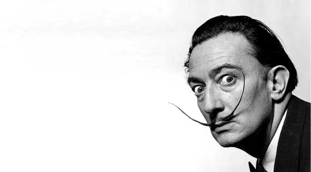 Surrealist artist, Salvador Dalí, sporting his famously long mustache.