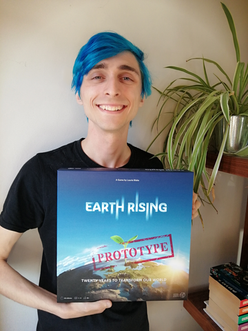 Laurie Blake holding the Earth Rising prototype