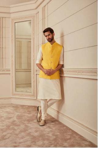 A Man Wearing Yellow Top Stitch Bundi