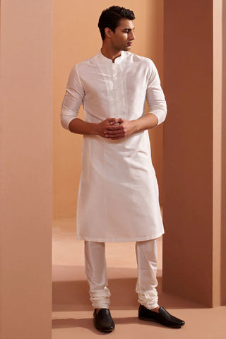 A Man Wearing White Embroidered Kurta Set