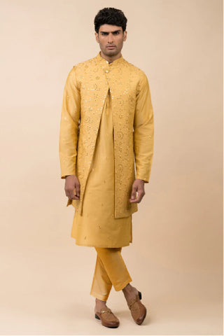 A Man Wearing Yellow Kurta Bundi Set