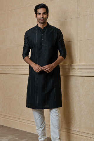 A Man Wearing Black Kurta Set