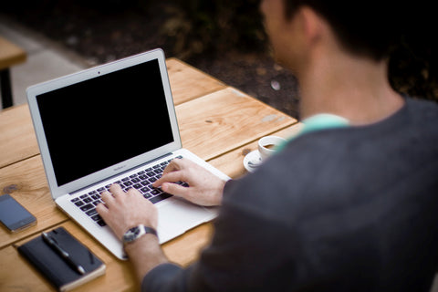 man working on a computer