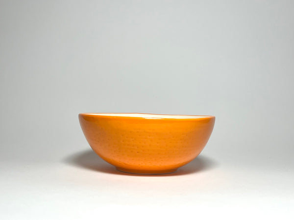 orange pottery bowl