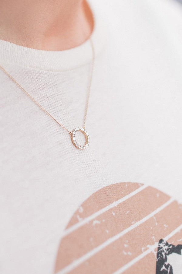 Jenny wearing By My Side Round and Baguette Diamond Necklace in Yellow Gold