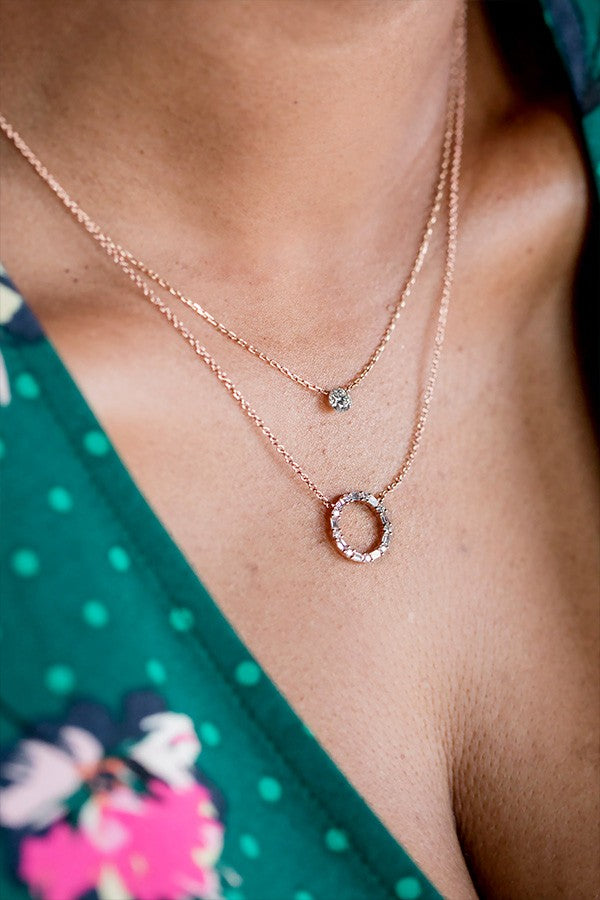 Close up photo of Monica wearing Single Drilled Diamond Necklace in Rose Gold By My Side Baguette Diamond Circle Necklace in Rose Gold