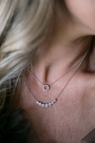 woman with the Bremer Jewelry Round Necklace and Round Diamond Necklace