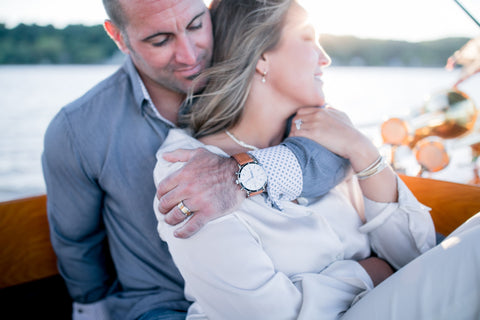 a couple with a fine watch and jewelry
