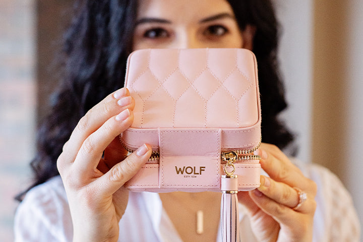 Bremer-Jewelry-2020-Valentines-Day-Gift-Guide-WOLF-pink-quilted-jewelry-box-model-holding