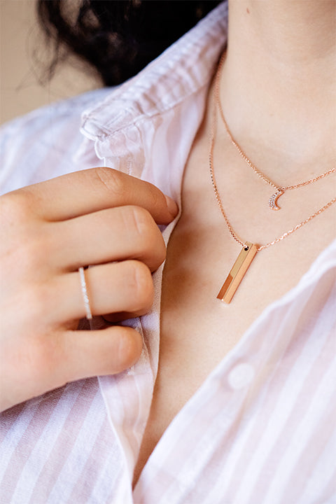 Bremer-Jewelry-2020-Valentines-Day-Gift-Guide-diamond-mini-moon-3d-vertical-bar-necklace-rose-gold-on-model