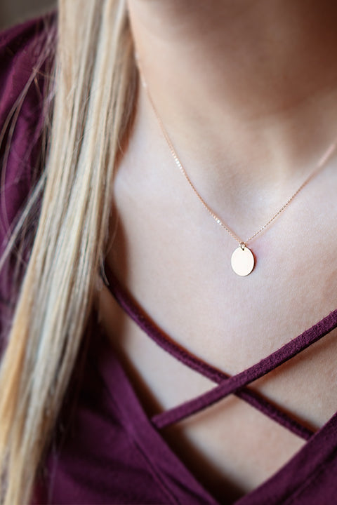 Bremer-Jewelry-2020-Valentines-Day-Gift-Guide-rose-gold-mini-disc-necklace-on-model