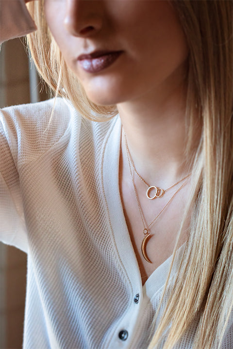 Bremer-Jewelry-2020-Valentines-Day-Gift-Guide-you-and-me-plain-necklace-and-this-is-us-crescent-moon-necklace-in-rose-gold-on-model