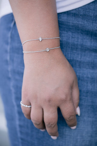 woman with a diamond bracelets and a fashion ring from Bremer Jewelry