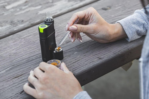 VIVANT DABOX is a portable wax vaporizer with flip door design for easy loading material