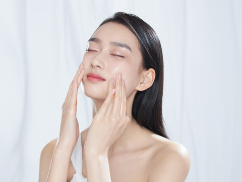 Woman washing face