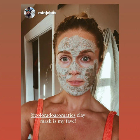 Woman with clay mask on
