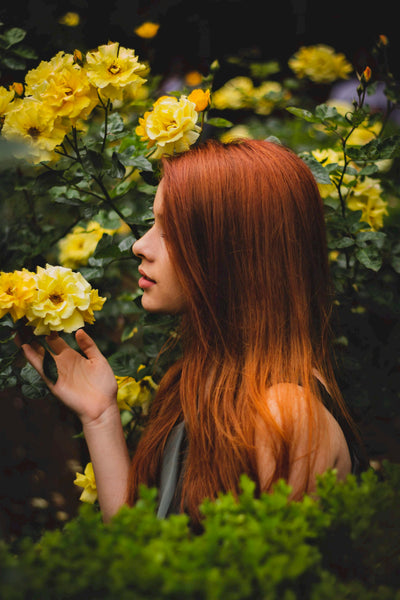 Red Haired Irish Woman with Roses