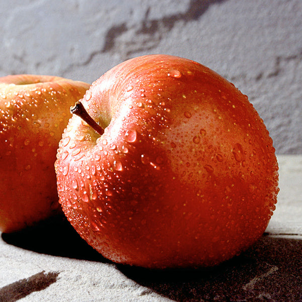 Premium Photo  Lots of tasty apples red organic envy apple new zealand top  view close up for wallpaper background