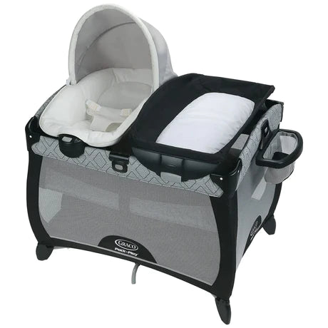 Graco Pack N’ Playard portable bassinet with attachable seat and diaper changing station