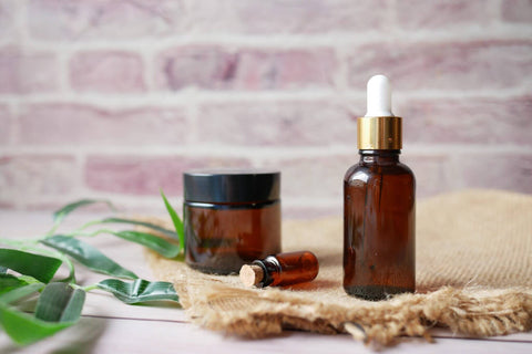 essential oil bottles with natural skincare at our heart